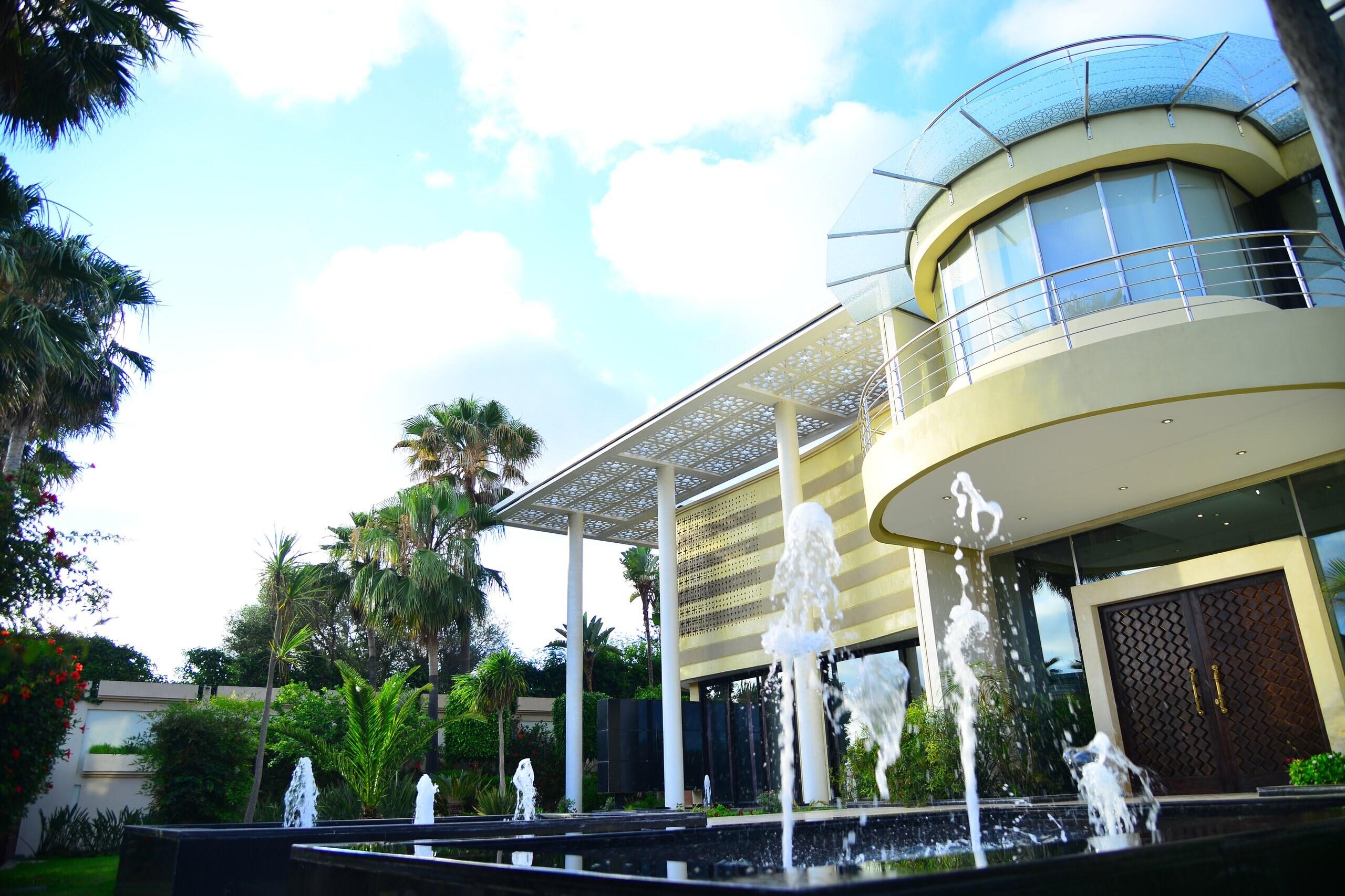 Fountains in the reflecting pool before the entrance tower