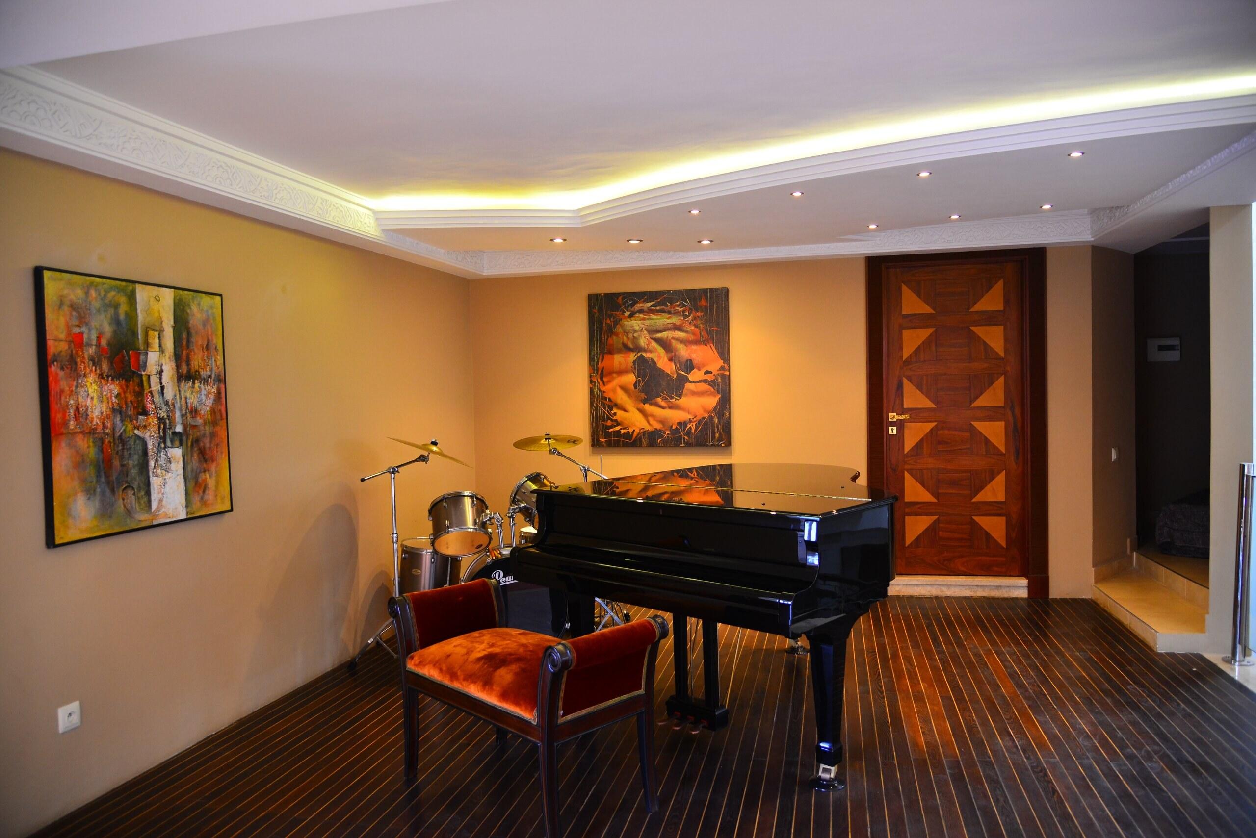 The piano bar, with a grand piano and a drum kit